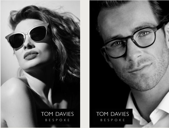 Tom Davies Bespoke Eyewear - Webster Eye Doctor | Clear Lake Eye Center Black and white portraits of a stylish woman wearing cat-eye sunglasses and a man in classic eyeglasses, both showcasing Tom Davies Bespoke eyewear. - Webster Eye Doctor | Clear Lake Eye Center